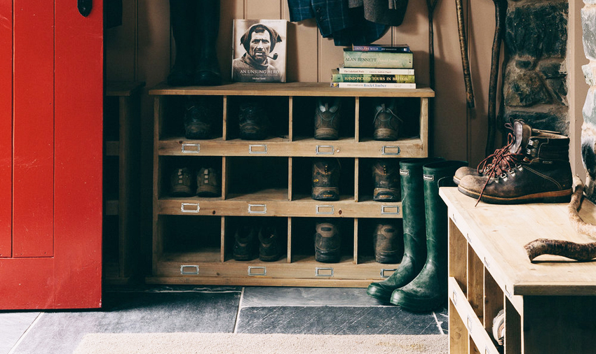 Shoe shelves in country style are characterized by the use of unpainted wood