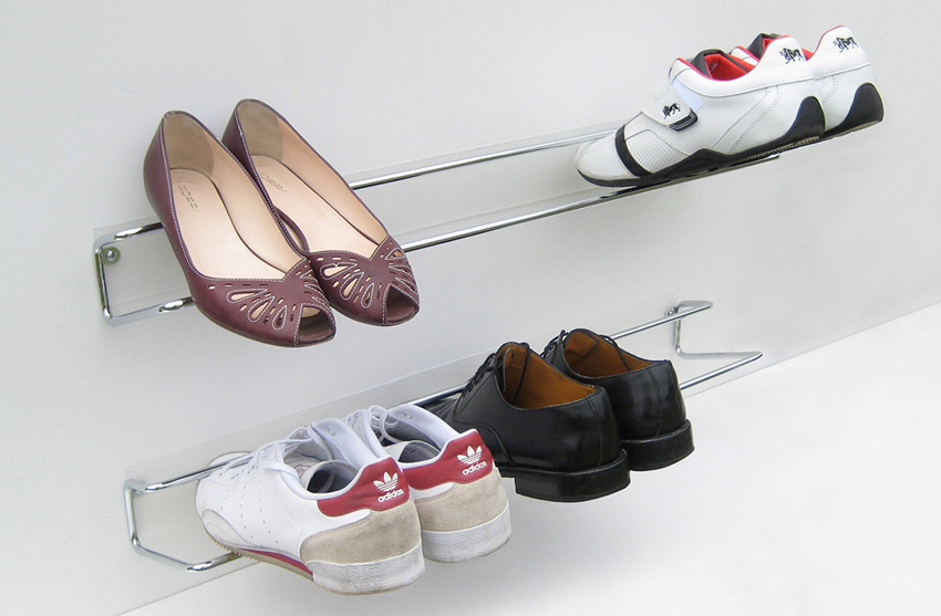To save space, you can make shoe shelves from metal pipes attached to the wall.