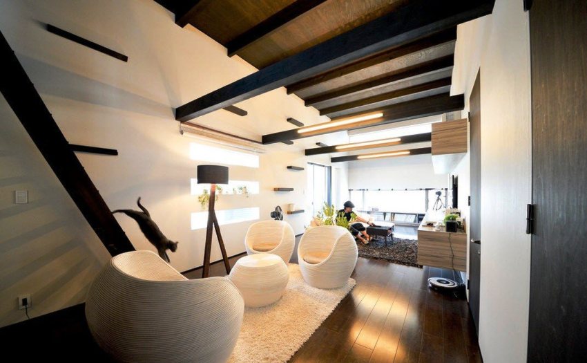 You can create an unusual and original design of the living room of a private house using beams from different types of wood