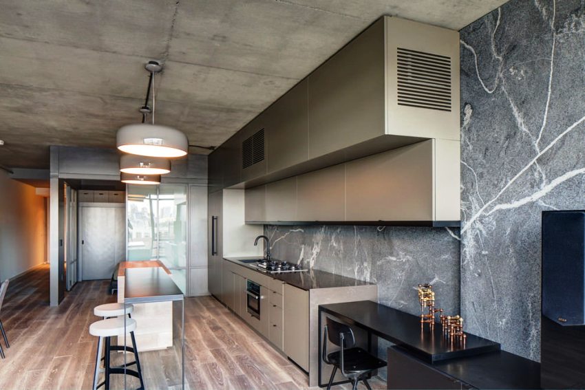 A loft-style kitchen should be minimalistic, both in furniture and in the selection of wallpaper