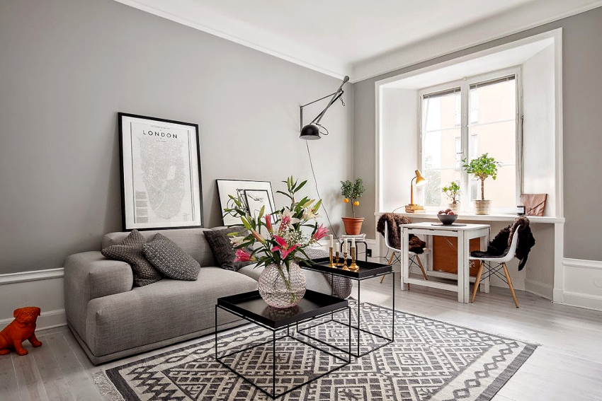You can revive the boring gray interior of the living room with the help of decor