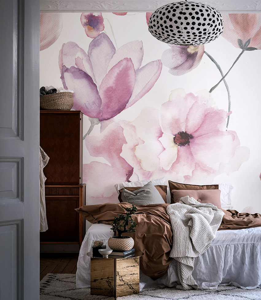 Images of flowers on the walls fill the bedroom with romance and tranquility