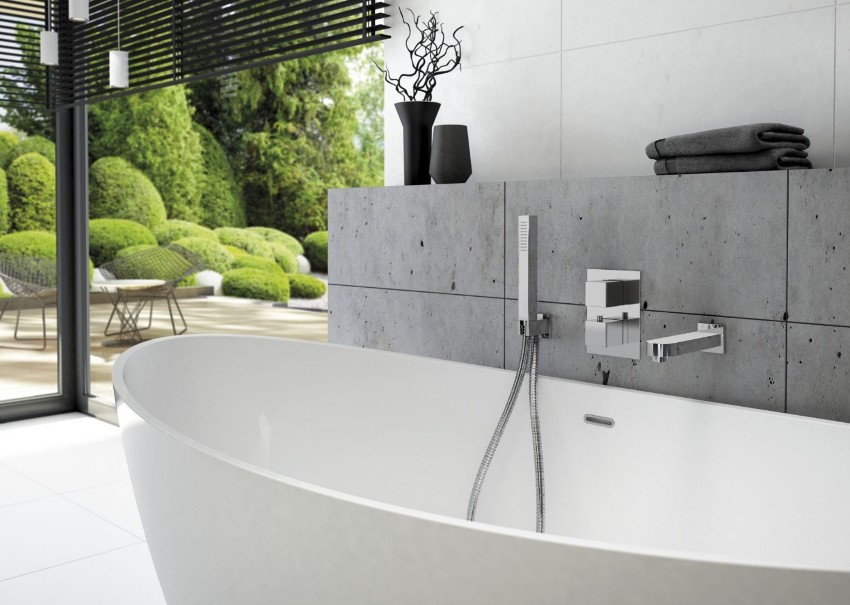 Thermostatic bath and shower mixer consists of a watering can and a spout