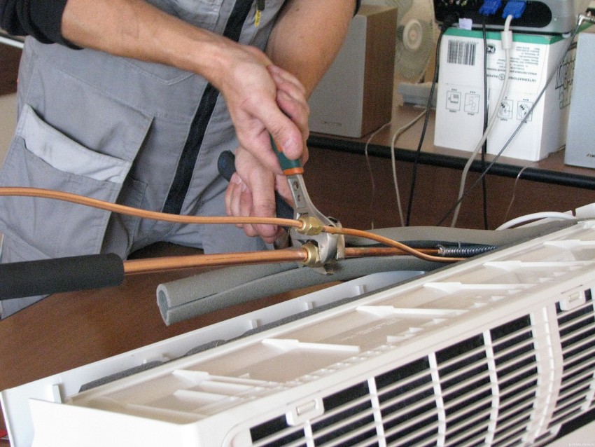 Copper pipes are connected to the indoor unit of the air conditioner