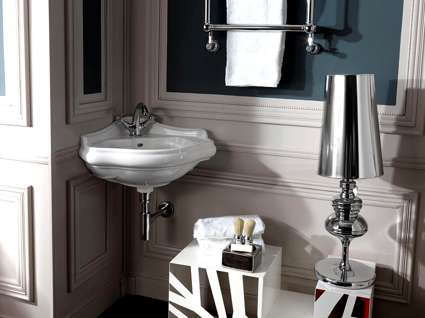 In a small room, you should choose a hanging corner sink