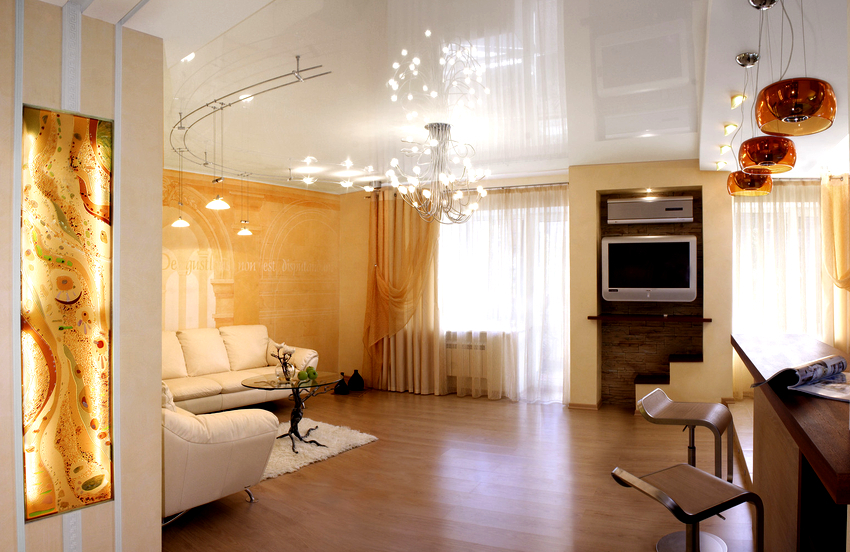 White stretch ceiling has good illumination, visually expands the room, allows you to install furniture of any color