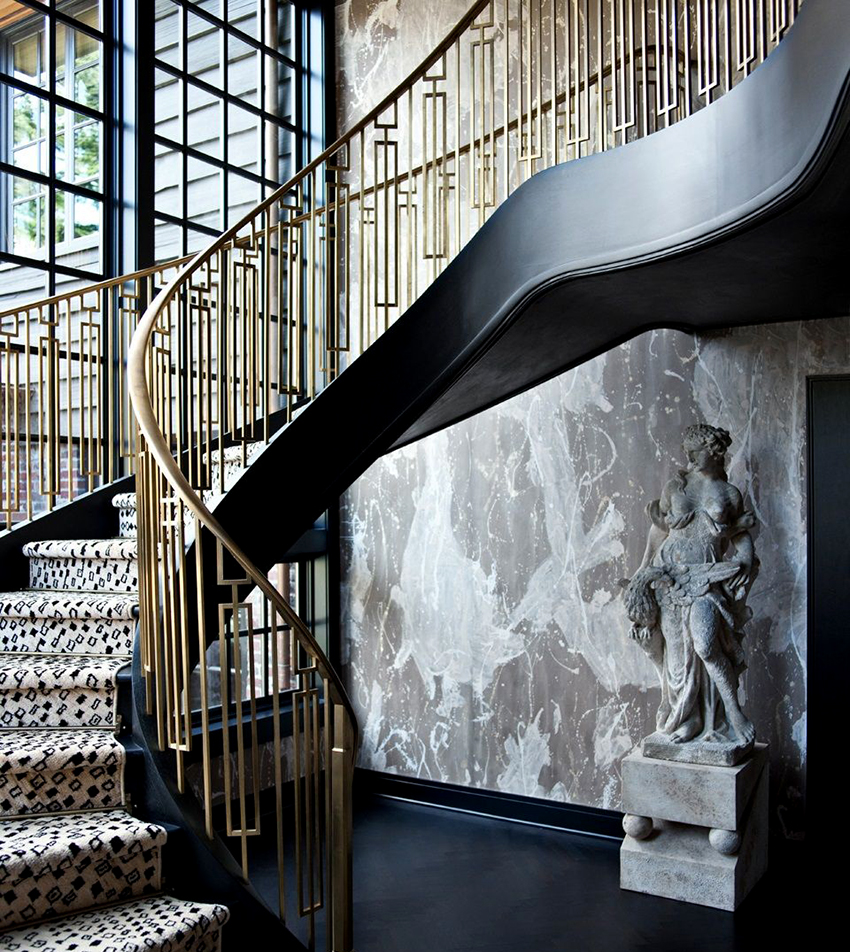 Forged railings can fit not only into a classic, but also into a modern interior