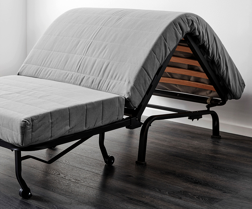 Armchair-bed with accordion mechanism consists of 3 sections that fold like an accordion