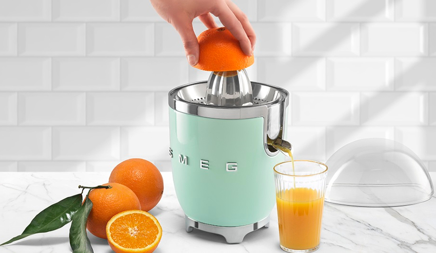 The manual citrus juicer is simple in design