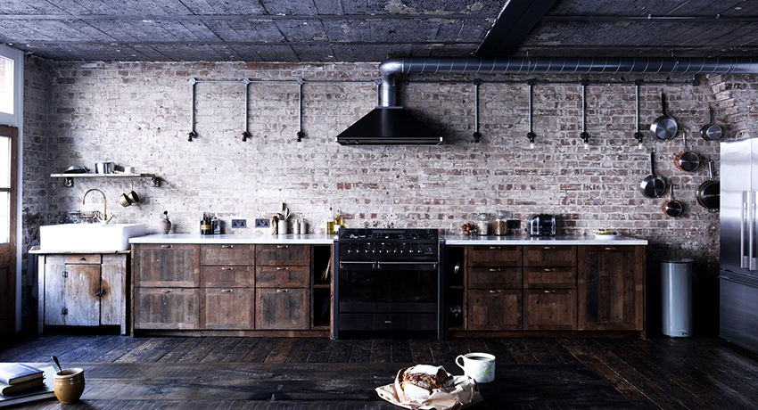 If the kitchen is made in a loft style, then the duct can become part of the interior and does not need masking