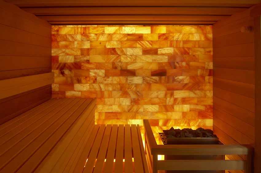 The steam room wall is made of Himalayan salt with lighting