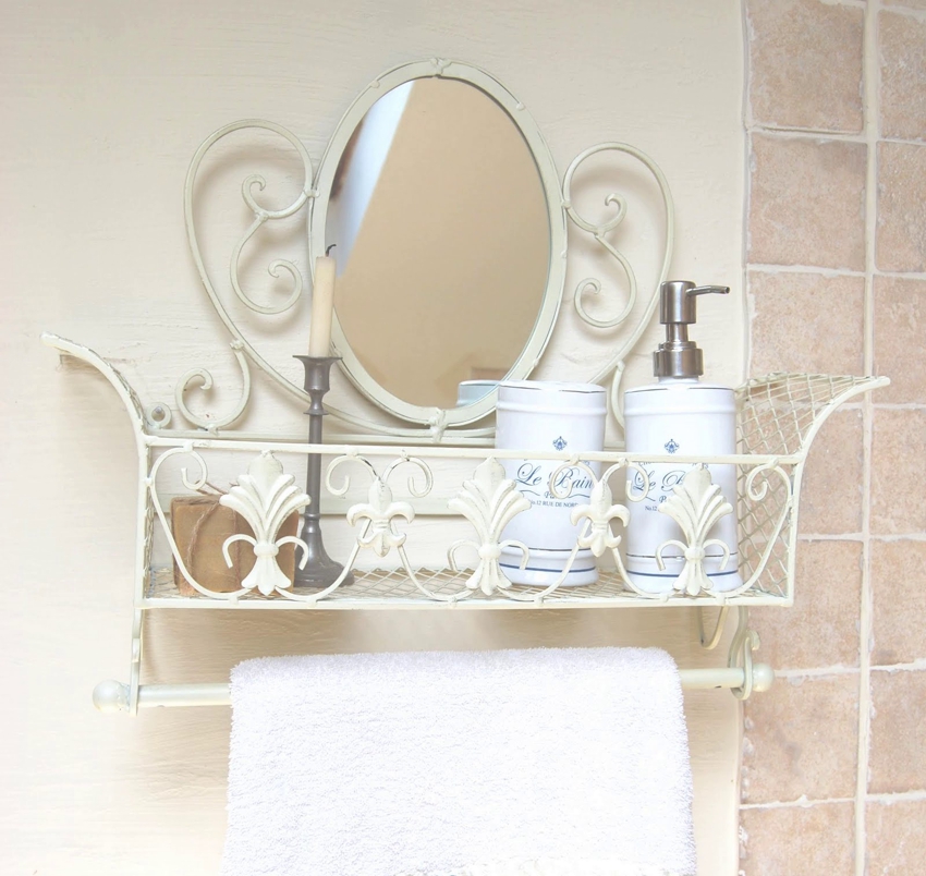 Krásná police z tepaného železa se zrcadlem a držákem na ručník