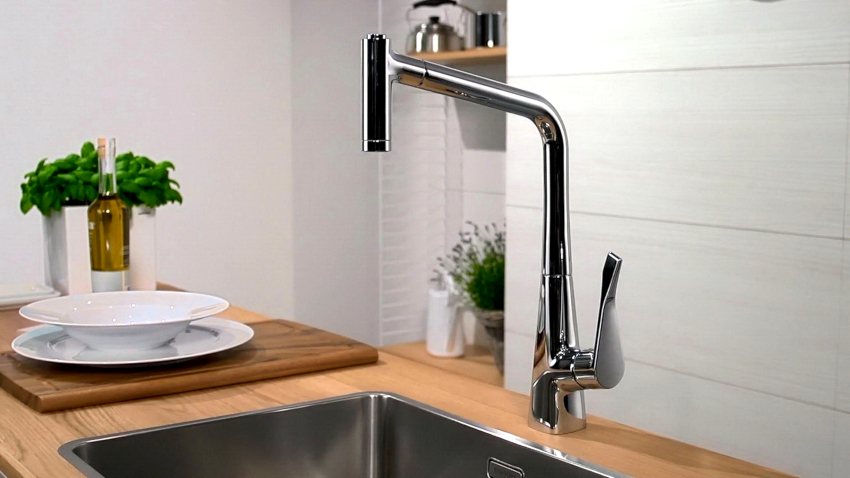 Kitchen faucets with pull-out spray can be attached to the sink, countertop and wall